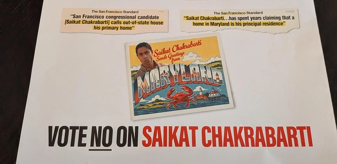 Anti-Chakrabarti mailer: a vintage 'Greetings from MARYLAND' postcard with Chakrabarti's face and a red crab illustration, framed by SF Standard headline clippings about him claiming a Maryland house as his primary residence, with 'VOTE NO ON SAIKAT CHAKRABARTI' across the bottom.